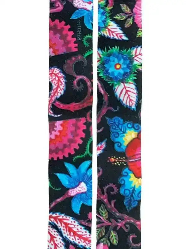 Vibrant floral and gear pattern cycling socks on black background, perfect for men's and women's bike rides.