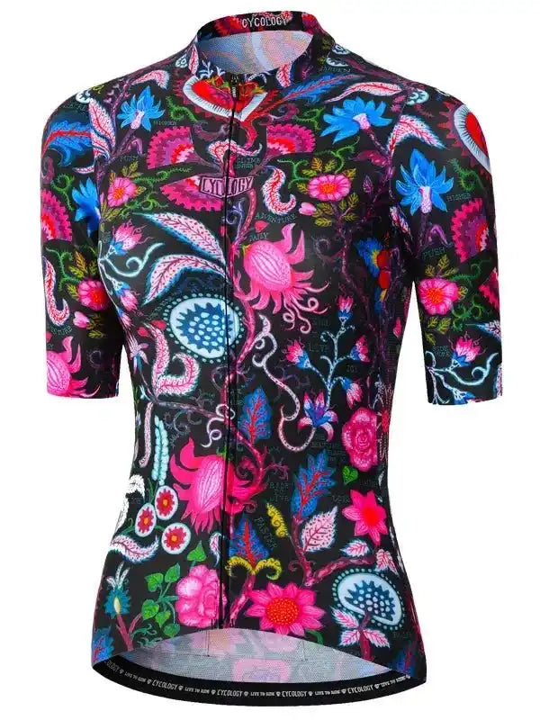 Women's cycling jersey with vibrant floral and paisley print on black, featuring full zipper and short sleeves.
