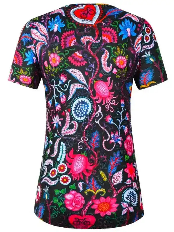 Women's cycling jersey with vibrant floral and heart pattern on black background, short sleeves