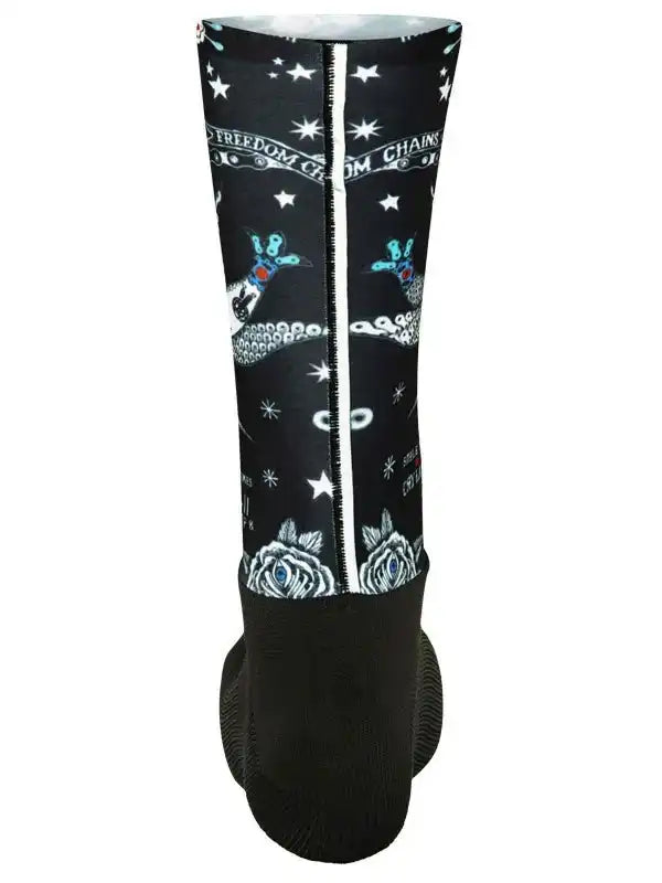 Black cycling leg warmer with stars, roses, and 'Freedom Chains' design for men's and women's bike rides