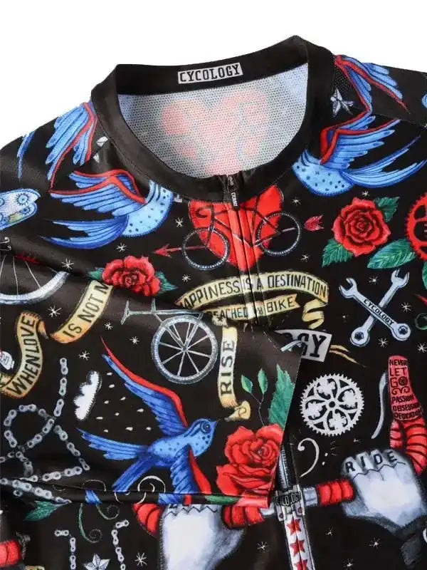 Men's cycling jersey with tattoo-style birds, roses, bikes, and motivational phrases on black fabric