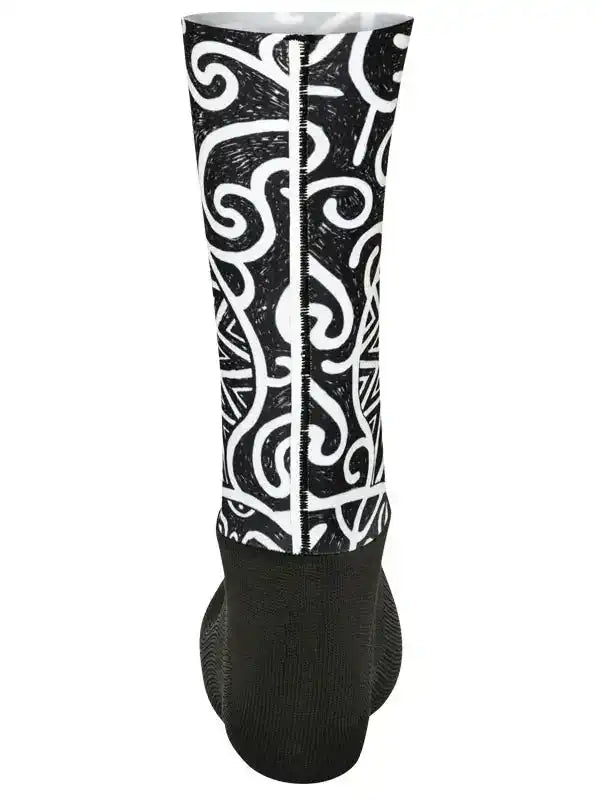 Black and white patterned cycling sock with swirl design, high-quality fabric for comfort and performance