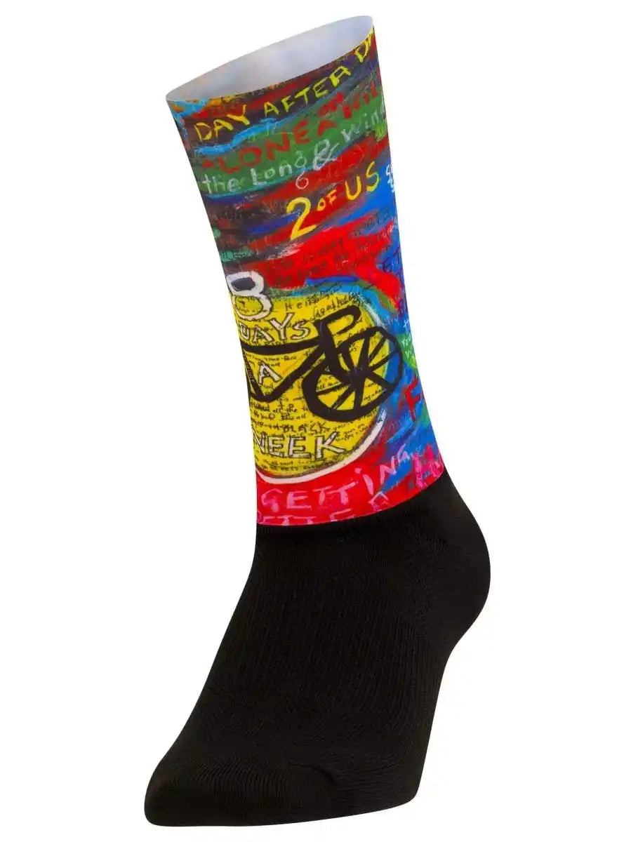 Colorful cycling sock with bike graphic and text design, perfect for cyclists and bike enthusiasts