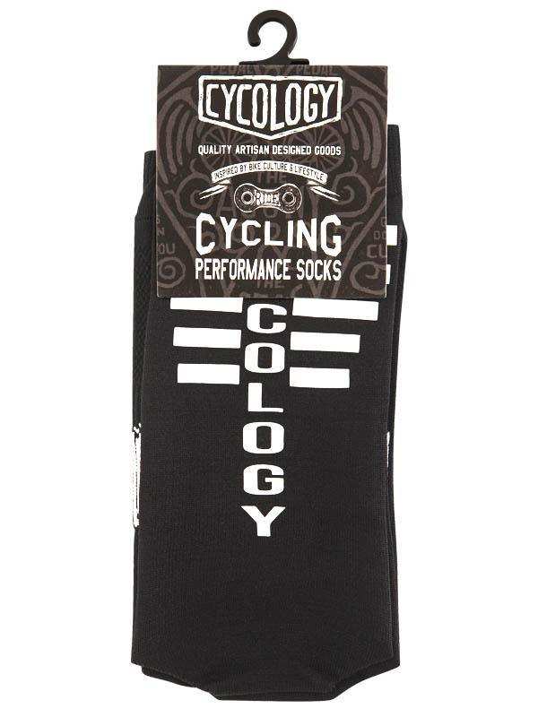 Black cycling performance socks with bold white 'CYCOLOGY' lettering, artisan-designed for bike culture