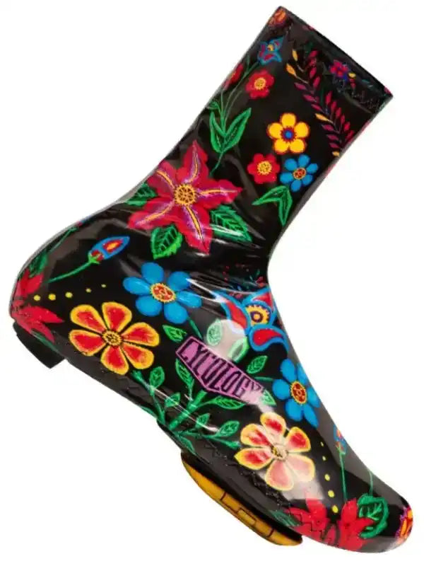 Black cycling shoe cover with vibrant floral print for wet weather riding