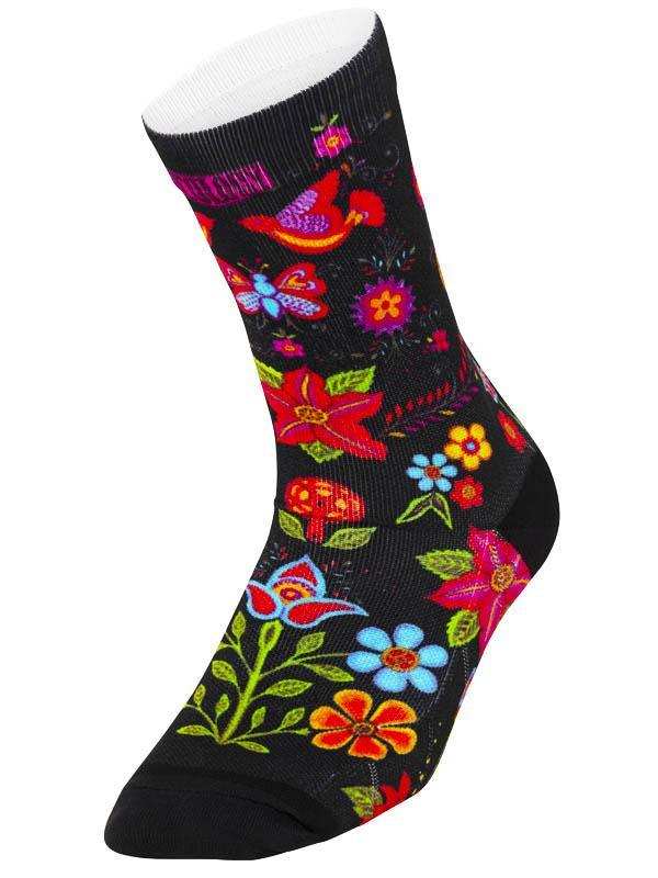 Black cycling sock with colorful floral and bird pattern, vibrant design for bike rides