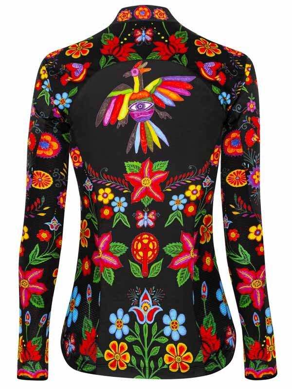 Women's cycling jersey with vibrant floral and bird print on black background, long sleeves