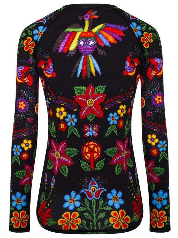 Women's cycling jersey with vibrant floral and bird print on black, long-sleeve design for road biking