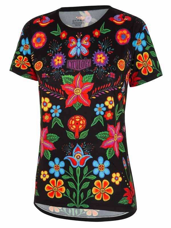 Women's cycling jersey with vibrant floral and butterfly print on black background, breathable fabric