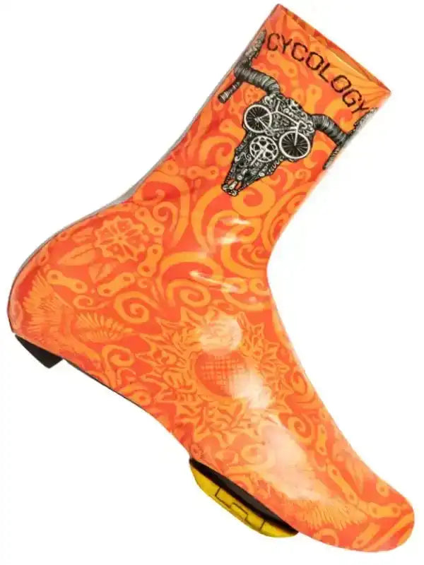 Orange cycling shoe cover with skull and bike graphic, waterproof design for road biking