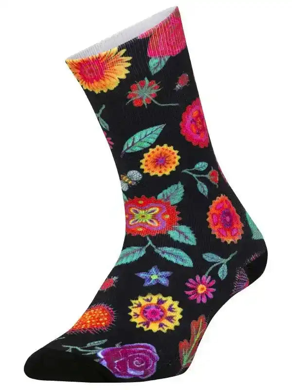 Black cycling sock with vibrant floral pattern, colorful flowers and leaves on dark background