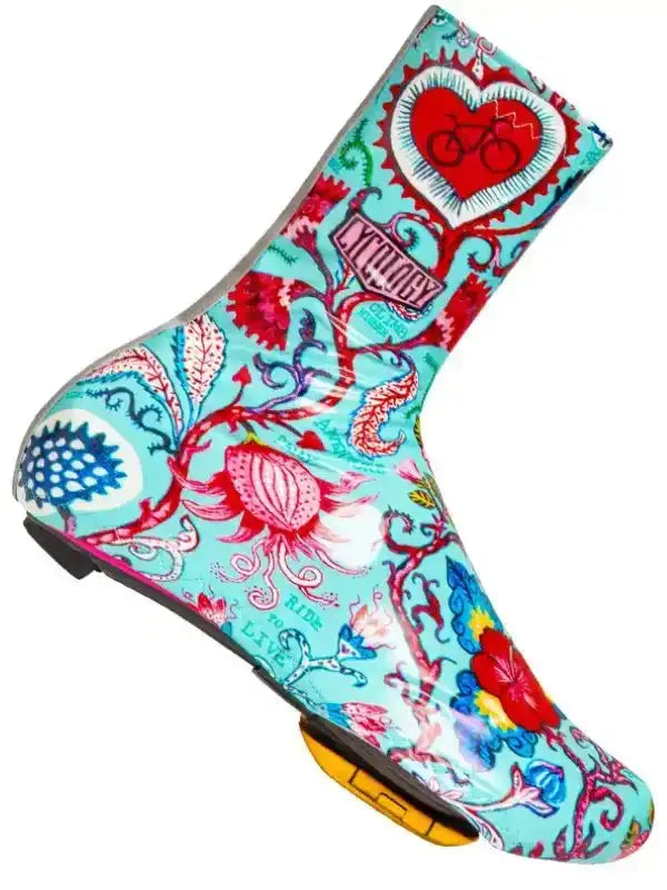 Colorful cycling shoe cover with floral and heart design, featuring bike graphics and 'Ride to Live' text