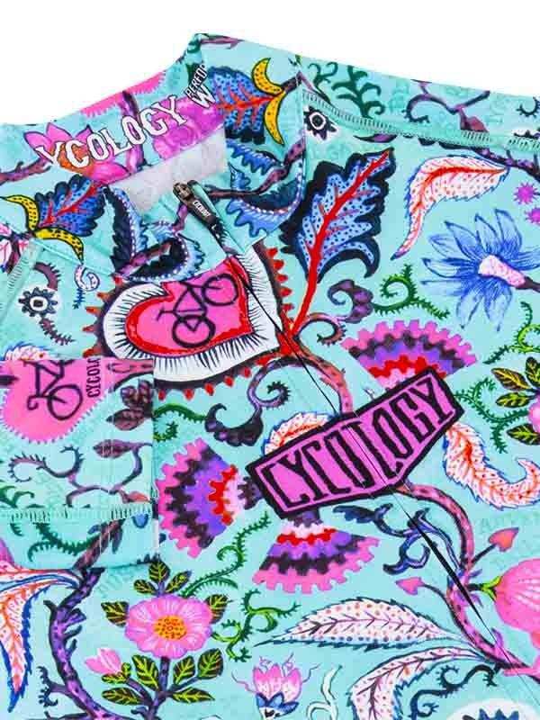 Vibrant floral and bicycle print women's cycling jersey with bold colors and unique design