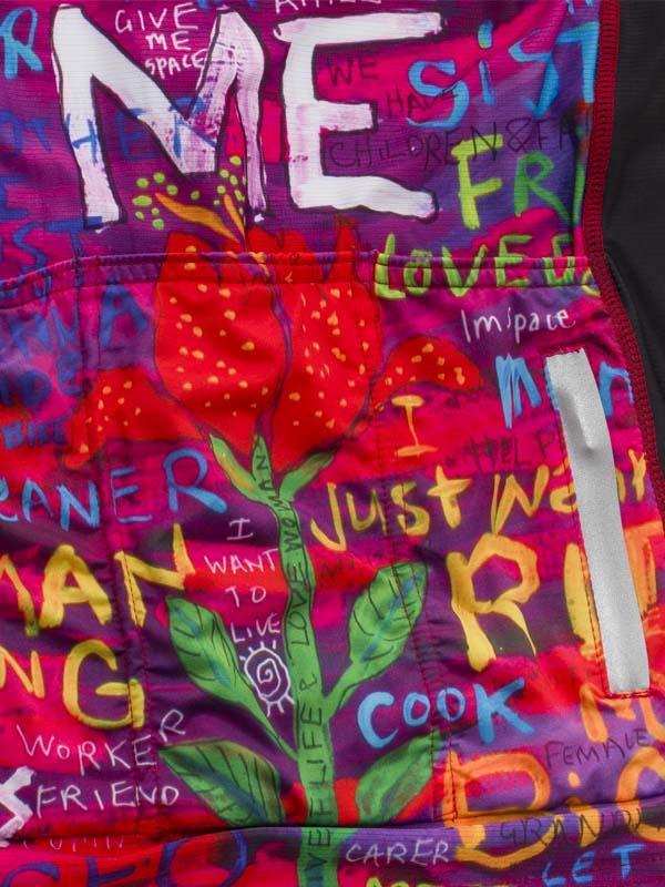 Vibrant cycling vest with bold graffiti-style text and red flower design, perfect for women's bike wear.