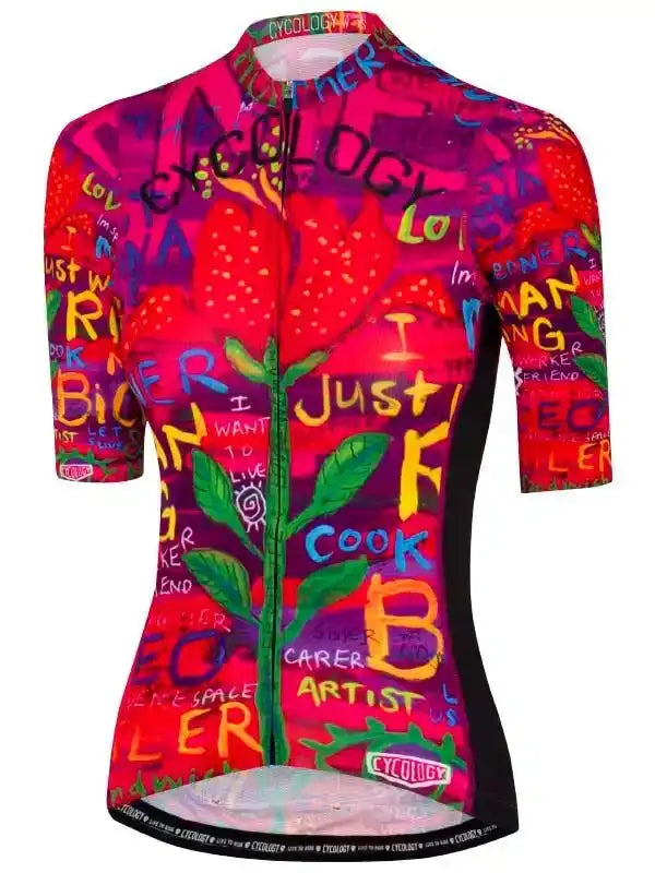 Vibrant women's cycling jersey with graffiti-style strawberry print and bold text design