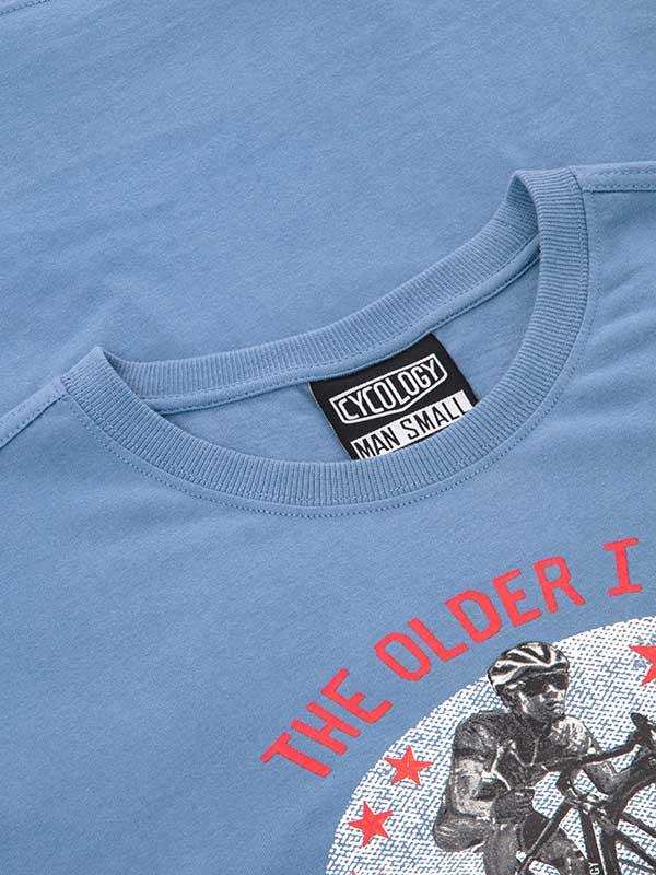 Light blue men's cycling t-shirt with 'The Older I' graphic and cyclist print, size small