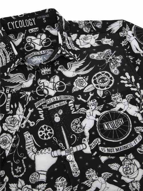 Black cycling shirt with white tattoo-style graphics, bikes, roses, and angel motifs for men's or women's ride wear.